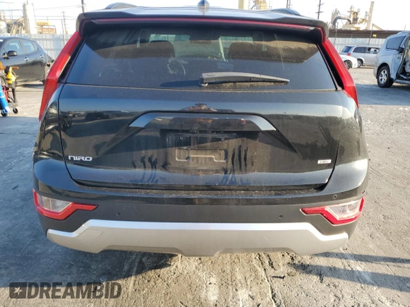 2023 Kia Niro EX with VIN KNDCR3LE9P5076681, listed as a Copart auction lot 42522465 with 56,896 mi miles and Salvage Title. Bid and sale history available at carsss.com. Image 6.