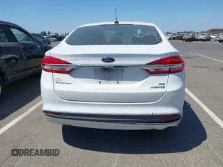 2018 Ford Fusion SE z VIN 3FA6P0LU1JR225930, wystawiony jako IAAI lot #42508239 z przebiegiem 202 272 mil mil oraz . Historia ofert i sprzedaży dostępna na DreamBid. Obrazek 16.