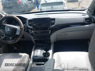 2019 Honda Pilot Touring 7-Passenger z VIN 5FNYF6H63KB000365, wystawiony jako IAAI lot #42154822 z przebiegiem 238 032 mil mil oraz . Historia ofert i sprzedaży dostępna na DreamBid. Obrazek 5.