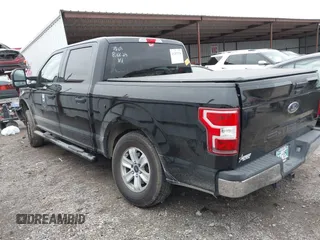 2018 Ford F-150 XL with VIN 1FTEW1EB0JKD85702, listed as a IAAI auction lot 41207356 with 136,528 mi miles. Bid and sale history available at carsss.com. Image 3.