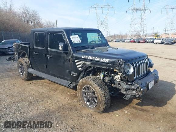 2021 Jeep Gladiator Overland z VIN 1C6HJTFG1ML606215, wystawiony jako IAAI lot #41771646 z przebiegiem 77 411 mil mil oraz . Historia ofert i sprzedaży dostępna na DreamBid. Obrazek 6.