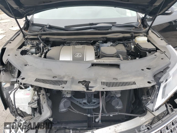 2022 Lexus RX 350L z VIN JTJHZKEAXN2024238, wystawiony jako Copart lot #54218355 z przebiegiem 18 761 mil mil oraz Szkoda całkowita • Salvage title. Historia ofert i sprzedaży dostępna na DreamBid. Obrazek 12.