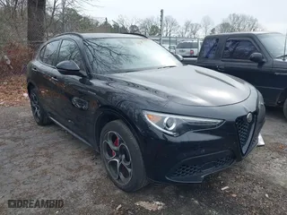 2023 Alfa Romeo Stelvio Ti with VIN ZASPAKBN6P7D56722, listed as a IAAI auction lot 41363962 with 50,073 mi miles. Bid and sale history available at carsss.com. Image 1.