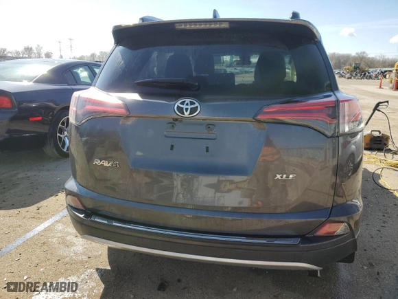 2018 Toyota RAV4 XLE with VIN JTMWFREV5JJ751818, listed as a Copart auction lot 50824115 with 69,859 mi miles and Salvage Title. Bid and sale history available at carsss.com. Image 6.