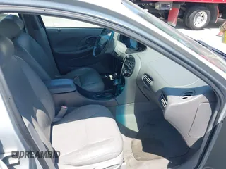 1996 Ford Taurus LX with VIN 1FALP53S5TG199843, listed as a IAAI auction lot 42430761 with 95,984 mi miles and . Bid and sale history available at DreamBid. Image 5.