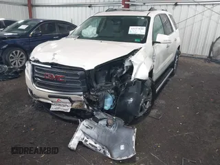 2014 GMC Acadia SLT z VIN 1GKKVSKD4EJ250739, wystawiony jako IAAI lot #42257848 z przebiegiem 78 672 mil mil oraz . Historia ofert i sprzedaży dostępna na DreamBid. Obrazek 6.