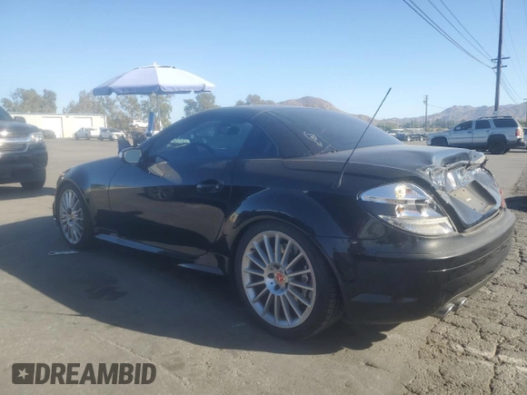 2006 Mercedes-Benz SLK-Class 5.5L AMG with VIN WDBWK73F16F093516, listed as a Copart auction lot 77485754 with 112,419 mi miles and Salvage Title. Bid and sale history available at carsss.com. Image 2.