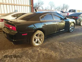 2014 Dodge Charger SXT with VIN 2C3CDXHG9EH305256, listed as a IAAI auction lot 41360219 with 170,192 mi miles and . Bid and sale history available at DreamBid. Image 4.