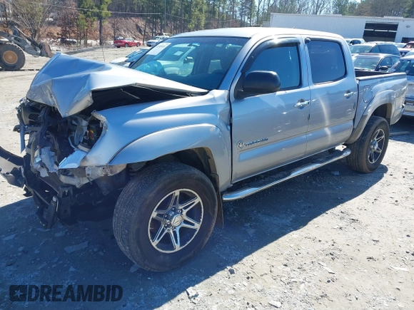 2014 Toyota Tacoma PreRunner with VIN 5TFJU4GNXEX061808, listed as a IAAI auction lot 41585931 with 214,240 mi miles. Bid and sale history available at carsss.com. Image 2.