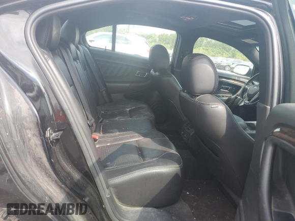 2013 Ford Taurus Limited with VIN 1FAHP2J87DG181051, listed as a Copart auction lot 70630404 with 157,323 mi miles and Salvage title. Bid and sale history available at DreamBid. Image 10.