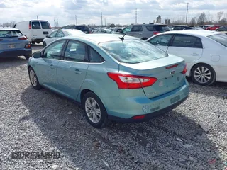 2012 Ford Focus SEL with VIN 1FAHP3H23CL311405, listed as a IAAI auction lot 41900982 with 163,526 mi miles and . Bid and sale history available at carsss.com. Image 3.