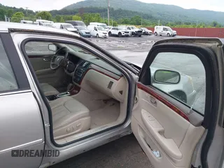 2006 Cadillac DTS 1SB z VIN 1G6KD57YX6U212463, wystawiony jako IAAI lot #42515167 z przebiegiem 186 693 mil mil oraz . Historia ofert i sprzedaży dostępna na DreamBid. Obrazek 5.