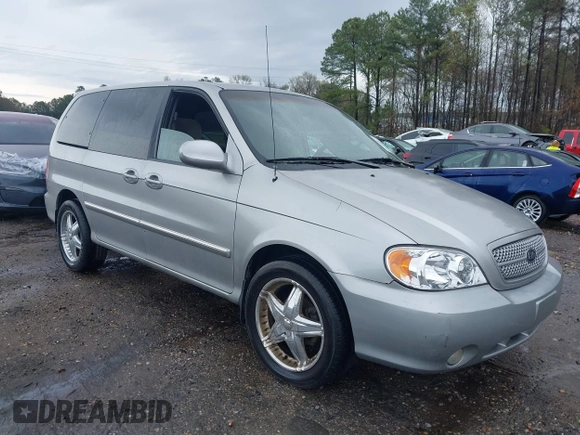 2004 Kia Sedona LX with VIN KNDUP131246567448, listed as a IAAI auction lot 41842992 with 231,424 mi miles. Bid and sale history available at carsss.com. Image 1.