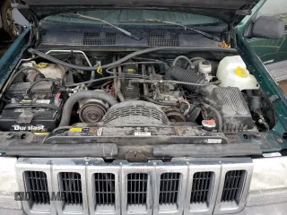 1997 Jeep Grand Cherokee TSi with VIN 1J4FX58S6VC602782, listed as a Copart auction lot 86605074 with 158,971 mi miles and Salvage Title. Bid and sale history available at carsss.com. Image 13.