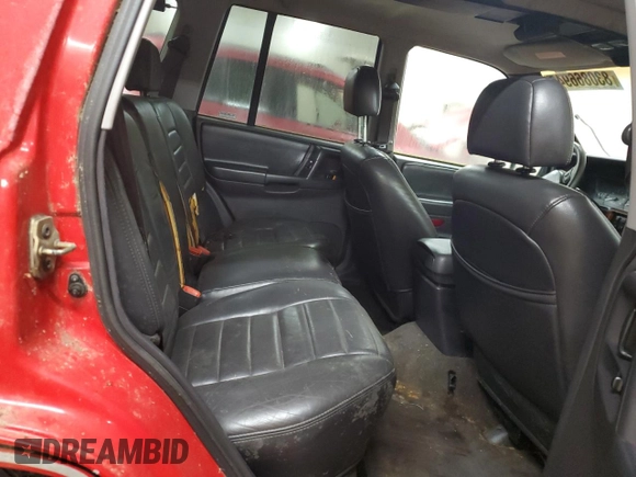 1997 Jeep Grand Cherokee Laredo with VIN 1J4GZ58Y9VC629994, listed as a Copart auction lot 83086694 with 252,147 mi miles and Salvage Title. Bid and sale history available at carsss.com. Image 11.