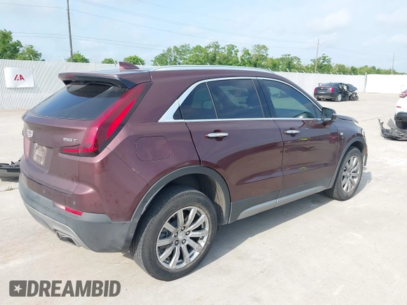2023 Cadillac XT4 FWD Premium Luxury with VIN 1GYFZCR47PF106017, listed as a IAAI auction lot 42283401 with 40,734 mi miles and . Bid and sale history available at DreamBid. Image 4.