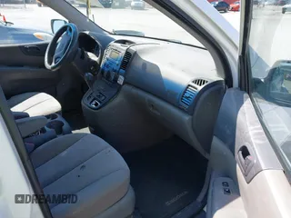 2011 Kia Sedona LX with VIN KNDMG4C79B6409885, listed as a IAAI auction lot 41971702 with 374,233 mi miles. Bid and sale history available at carsss.com. Image 5.
