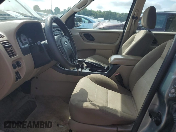 2007 Ford Escape XLS with VIN 1FMYU02Z27KB99534, listed as a Copart auction lot 66872184 with 107,072 mi miles and Salvage Title. Bid and sale history available at carsss.com. Image 7.