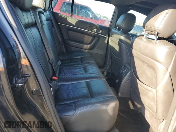 2015 Lincoln MKS z VIN 1LNHL9DK7FG600858, wystawiony jako Copart lot #46167275 z przebiegiem 208 674 mil mil oraz Szkoda całkowita • Salvage title. Historia ofert i sprzedaży dostępna na DreamBid. Obrazek 10.