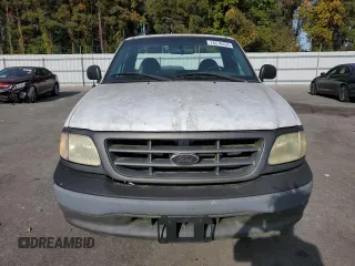 2003 Ford F-150 XL with VIN 1FTRF17W03NA39409, listed as a Copart auction lot 78578434 with 142,299 mi miles and Salvage Title. Bid and sale history available at DreamBid. Image 5.