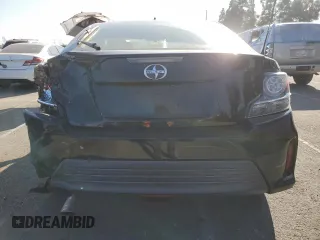 2016 Scion tC with VIN JTKJF5C79GJ020110, listed as a Copart auction lot 86995214 with 79,165 mi miles and Salvage Title. Bid and sale history available at carsss.com. Image 6.