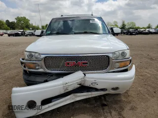2003 GMC Yukon Denali z VIN 1GKEK63U33J316027, wystawiony jako Copart lot #56869815 z przebiegiem 200 916 mil mil oraz Szkoda całkowita • Salvage title. Historia ofert i sprzedaży dostępna na DreamBid. Obrazek 5.