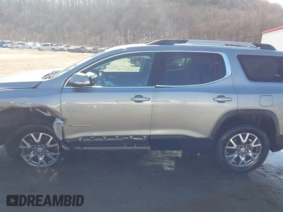 2023 GMC Acadia SLT with VIN 1GKKNUL49PZ213426, listed as a IAAI auction lot 41725515 with 38,038 mi miles and . Bid and sale history available at DreamBid. Image 14.
