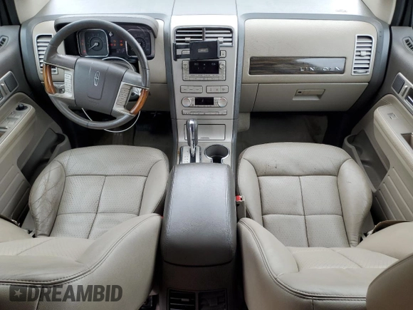 2007 Lincoln MKX z VIN 2LMDU68C07BJ35947, wystawiony jako Copart lot #51804485 z przebiegiem 182 536 mil mil oraz Szkoda całkowita • Salvage title. Historia ofert i sprzedaży dostępna na DreamBid. Obrazek 8.