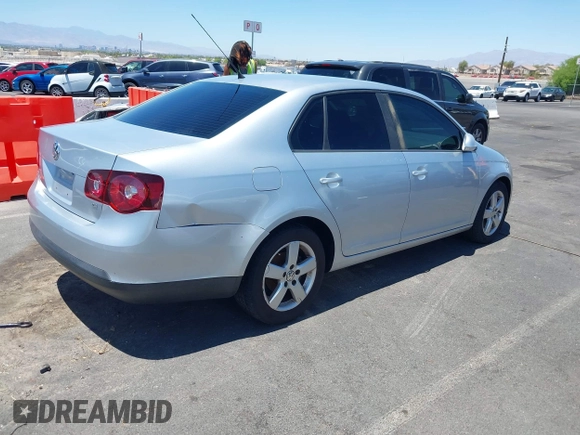 2008 Volkswagen Jetta S with VIN 3VWHM71K58M064797, listed as a IAAI auction lot 42676040 with 211,145 mi miles and . Bid and sale history available at DreamBid. Image 4.