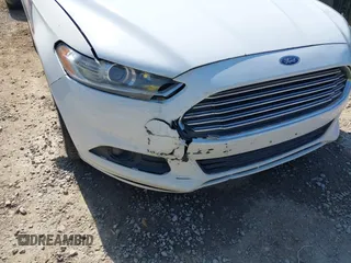 2014 Ford Fusion SE with VIN 3FA6P0HD0ER123288, listed as a IAAI auction lot 42069373 with 156,867 mi miles and . Bid and sale history available at DreamBid. Image 6.
