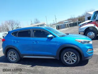 2017 Hyundai Tucson SE Plus with VIN KM8J3CA4XHU315340, listed as a IAAI auction lot 41857937 with 83,957 mi miles. Bid and sale history available at carsss.com. Image 13.