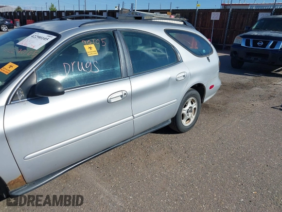 1996 Ford Taurus GL z VIN 1FALP57U9TG184497, wystawiony jako IAAI lot #42290105 z przebiegiem 149 155 mil mil oraz . Historia ofert i sprzedaży dostępna na DreamBid. Obrazek 6.