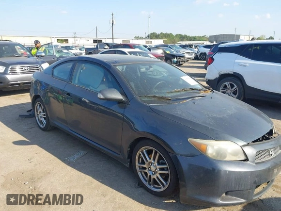 2005 Scion tC with VIN JTKDE177150041877, listed as a IAAI auction lot 41877581 with 240,179 mi miles. Bid and sale history available at carsss.com. Image 1.