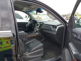 2016 Chevrolet Suburban LT with VIN 1GNSKHKC4GR233059, listed as a IAAI auction lot 42137869 with 115,571 mi miles. Bid and sale history available at carsss.com. Image 5.