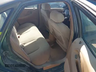 1996 Ford Taurus LX with VIN 1FALP53S0TG125665, listed as a IAAI auction lot 42290691 with 91,152 mi miles and . Bid and sale history available at DreamBid. Image 8.