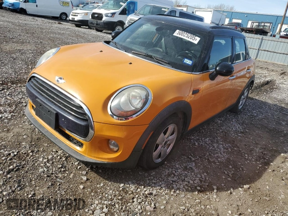2016 MINI Hardtop 4 Door with VIN WMWXU1C50G2D57757, listed as a Copart auction lot 50025205 with 133,464 mi miles and Salvage title. Bid and sale history available at DreamBid. Image 1.