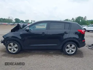 2013 Kia Sportage LX z VIN KNDPBCA28D7411444, wystawiony jako IAAI lot #42415041 z przebiegiem 150 524 mil mil oraz . Historia ofert i sprzedaży dostępna na DreamBid. Obrazek 15.