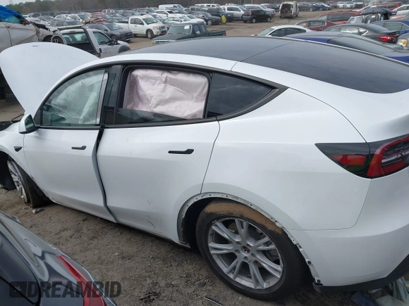2023 Tesla Model Y Long Range with VIN 7SAYGDEE2PA145398, listed as a IAAI auction lot 41546573 with 20,812 mi miles and . Bid and sale history available at carsss.com. Image 13.