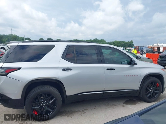 2019 Chevrolet Traverse Premier with VIN 1GNEVKKW3KJ287097, listed as a IAAI auction lot 42497740 with 72,836 mi miles and . Bid and sale history available at DreamBid. Image 13.