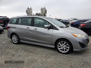 2012 Mazda 5 Grand Touring с VIN JM1CW2DL2C0101833, выставлен на аукционе Copart как лот 60362815 с пробегом 164 556 миль миль и Чистый • Clean title. История ставок и продаж доступна на DreamBid. Изображение 4.