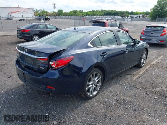 2015 Mazda 6 i Grand Touring with VIN JM1GJ1W53F1200121, listed as a IAAI auction lot 42173036 with 76,184 mi miles and . Bid and sale history available at DreamBid. Image 4.