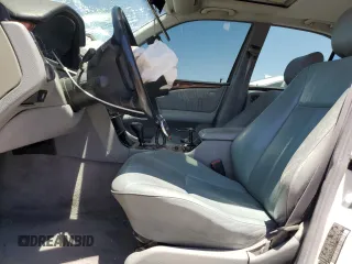 1999 Mercedes-Benz E-Class with VIN WDBJF70H5XA831773, listed as a Copart auction lot 71320244 with 145,181 mi miles and Salvage Title. Bid and sale history available at carsss.com. Image 7.
