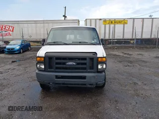 2013 Ford Econoline Cargo Commercial with VIN 1FTNE1EW2DDB11061, listed as a IAAI auction lot 41808318 with 230,677 mi miles. Bid and sale history available at carsss.com. Image 11.