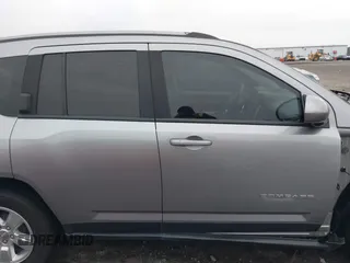 2016 Jeep Compass Latitude with VIN 1C4NJCEA2GD719694, listed as a IAAI auction lot 41508771 with 121,469 mi miles. Bid and sale history available at carsss.com. Image 14.