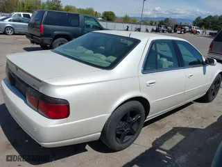 2003 Cadillac Seville Touring STS with VIN 1G6KY54963U110607, listed as a IAAI auction lot 42080691 with 79,605 mi miles. Bid and sale history available at carsss.com. Image 4.