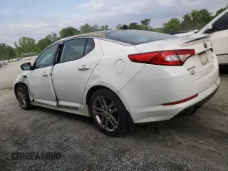 2013 Kia Optima SX z VIN 5XXGR4A62DG118828, wystawiony jako Copart lot #56252725 z przebiegiem 176 359 mil mil oraz Szkoda całkowita • Salvage title. Historia ofert i sprzedaży dostępna na DreamBid. Obrazek 2.