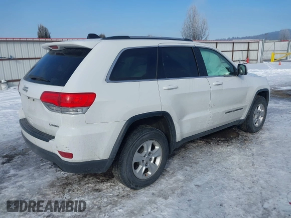 2017 Jeep Grand Cherokee Laredo with VIN 1C4RJFAG3HC688623, listed as a IAAI auction lot 41561414 with 75,407 mi miles. Bid and sale history available at carsss.com. Image 4.