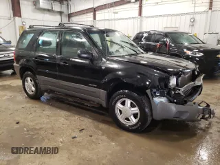 2001 Ford Escape XLS with VIN 1FMYU02121KA65155, listed as a Copart auction lot 42021865 with 0 mi miles and Non Repairable. Bid and sale history available at carsss.com. Image 4.