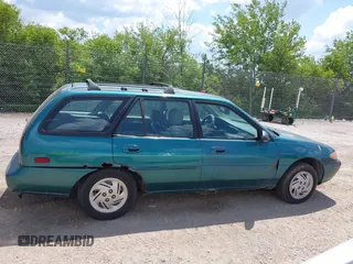 1997 Ford Escort LX with VIN 3FALP15P5VR126145, listed as a IAAI auction lot 42637921 with 148,109 mi miles and . Bid and sale history available at DreamBid. Image 13.