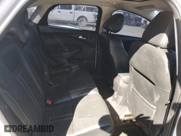 2014 Ford Focus Titanium with VIN 1FADP3J20EL122447, listed as a Copart auction lot 75774344 with 188,413 mi miles and Salvage Title. Bid and sale history available at carsss.com. Image 10.